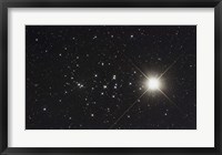 Framed Saturn in the Beehive Star Cluster