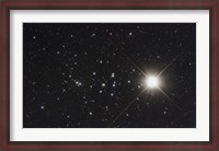 Framed Saturn in the Beehive Star Cluster