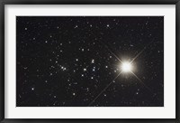 Framed Saturn in the Beehive Star Cluster