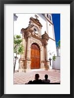 Framed Silhouette of Women Talking in Front of Cathedral, Marbella, Spain