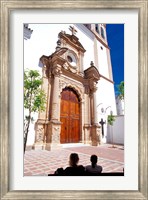 Framed Silhouette of Women Talking in Front of Cathedral, Marbella, Spain