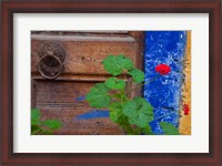 Framed Geraniums and old door in Chania, Crete, Greece