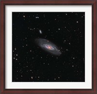 Framed Messier 106, a spiral galaxy in the Constellation Canes Venatici