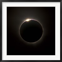 Framed Solar Eclipse with prominences and diamond ring effect