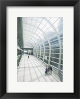 Framed Business Travelers in Modern Airport
