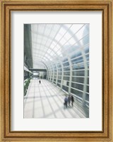 Framed Business Travelers in Modern Airport