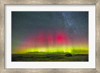 Framed Aurora borealis above Grasslands National Park in Saskatchewan, Canada