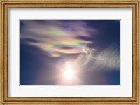 Framed Iridescent clouds near the Sun