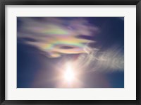 Framed Iridescent clouds near the Sun