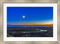 Framed Moon with Antares, Mars and Saturn over Bow River in Alberta, Canada