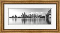 Framed Sydney Harbour Bridge and skylines at dusk, Sydney, New South Wales, Australia