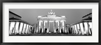 Framed Low angle view of a gate lit up at dusk, Brandenburg Gate, Berlin, Germany BW