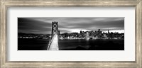 Framed Bridge lit up at dusk, Bay Bridge, San Francisco, California