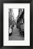 Framed Scooters and bicycles parked in a street, Amsterdam, Netherlands