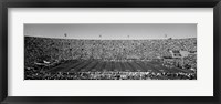 Framed Football stadium full of spectators, Los Angeles Memorial Coliseum, California