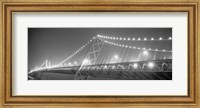 Framed Suspension bridge lit up at night, Bay Bridge, San Francisco, California