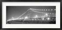 Framed Suspension bridge lit up at night, Bay Bridge, San Francisco, California