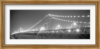 Framed Suspension bridge lit up at night, Bay Bridge, San Francisco, California