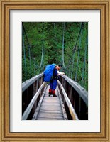 Framed Hikers on a Footbridge Across Pemigewasset River, New Hampshire