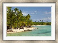 Framed Beach, palm trees and beachfront bures, Plantation Island Resort, Malolo Lailai Island, Mamanuca Islands, Fiji
