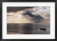 Framed Dramatic light over a little boat, Mamanucas Islands, Fiji, South Pacific