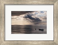 Framed Dramatic light over a little boat, Mamanucas Islands, Fiji, South Pacific