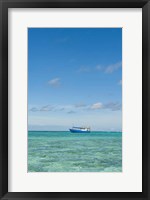 Framed Fishing boat in the turquoise waters of the blue lagoon, Fiji