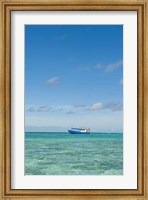 Framed Fishing boat in the turquoise waters of the blue lagoon, Fiji