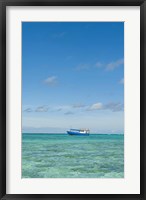 Framed Fishing boat in the turquoise waters of the blue lagoon, Fiji