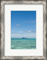 Framed Fishing boat in the turquoise waters of the blue lagoon, Fiji