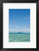 Framed Fishing boat in the turquoise waters of the blue lagoon, Fiji