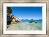 Framed Little motorboats anchoring before the Sawa-I-Lau Caves, Yasawa, Fiji, South Pacific