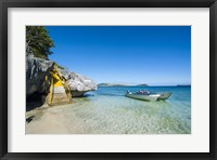 Framed Little motorboats anchoring before the Sawa-I-Lau Caves, Yasawa, Fiji, South Pacific