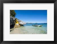 Framed Little motorboats anchoring before the Sawa-I-Lau Caves, Yasawa, Fiji, South Pacific