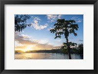 Framed Sunset over the beach of resort, Nacula Island, Yasawa, Fiji, South Pacific