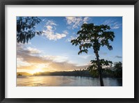 Framed Sunset over the beach of resort, Nacula Island, Yasawa, Fiji, South Pacific