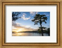 Framed Sunset over the beach of resort, Nacula Island, Yasawa, Fiji, South Pacific