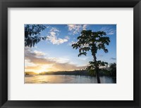 Framed Sunset over the beach of resort, Nacula Island, Yasawa, Fiji, South Pacific