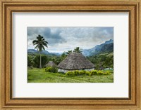 Framed Traditional thatched roofed huts in Navala, Fiji, South Pacific