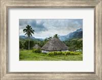 Framed Traditional thatched roofed huts in Navala, Fiji, South Pacific