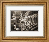 Framed Young Buddhist Monk praying, Thailand (sepia)