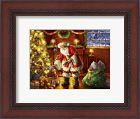 Framed Santa putting gifts under tree