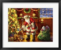 Framed Santa putting gifts under tree