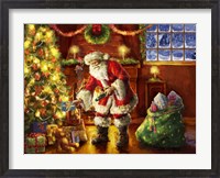 Framed Santa putting gifts under tree