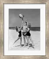 Framed 1950s Teens Jumping For Beach Ball
