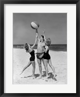 Framed 1950s Teens Jumping For Beach Ball