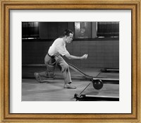 Framed 1950s Side View Of Man Bowling