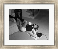Framed 1960s Teenage Girl Lying On Floor
