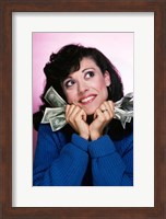 Framed Excited Brunette Woman Holding Several Dollar Bills