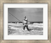 Framed 1950s Older Man Standing In Surf
